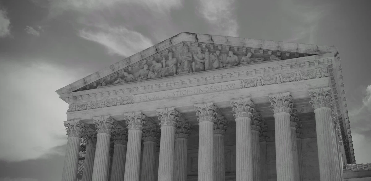 A neoclassical courthouse with tall stone columns